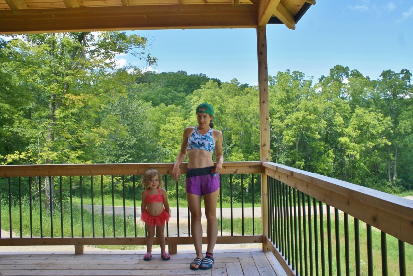 On the deck of our new house with Mischa. Now we live only a mile from Blue Mound State Park with has great trails!